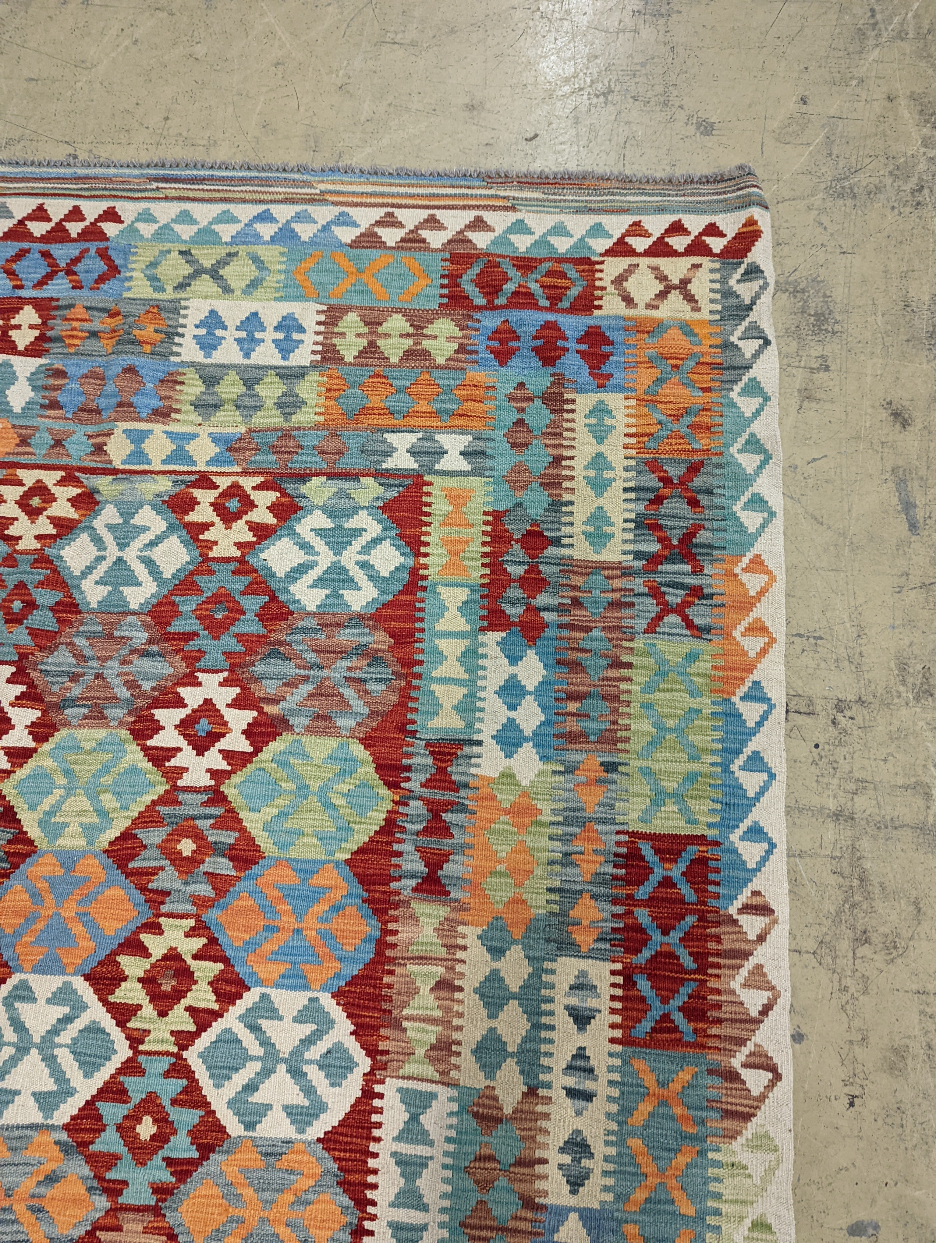 An Anatolian Kilim flatweave carpet, 390 x 300cm